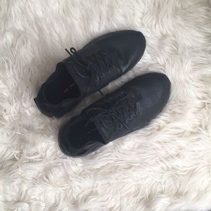 Black leather Nike Huaraches